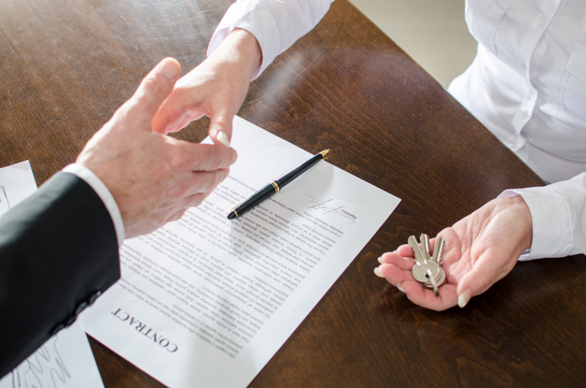 Estate Agent shaking Hands With Attorney Estate Agent shaking Hands With Attorney
